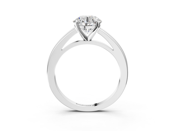 White gold Round Solitaire Diamond Ring with Four-Prong Setting and Classic Band