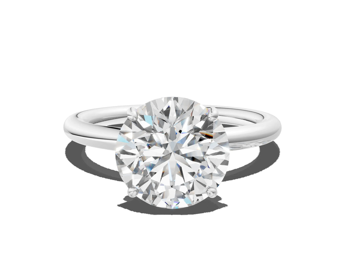White gold Round Solitaire Diamond Ring with Four-Prong Setting on a Plain Band_38
