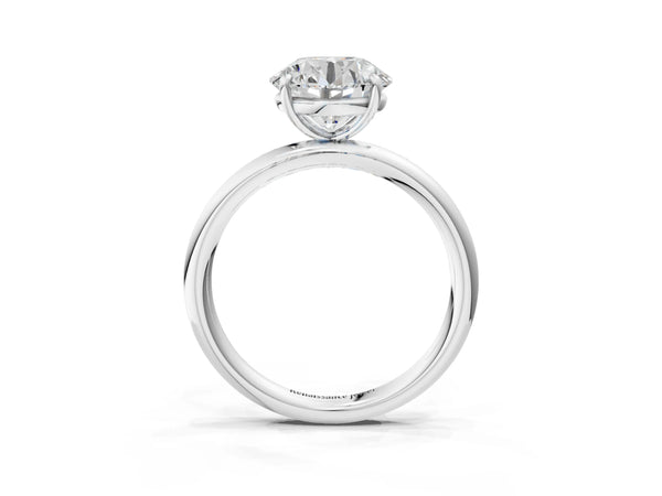White gold Round Solitaire Diamond Ring with Four-Prong Setting on a Plain Band