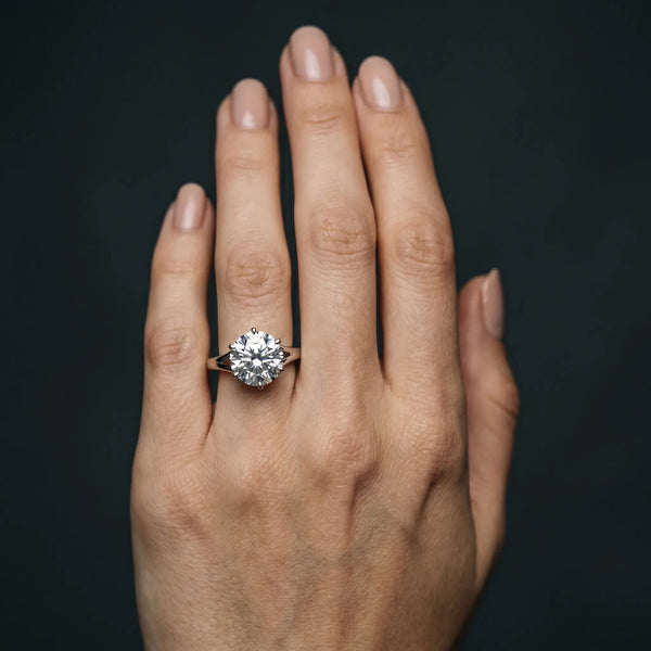 White gold Round Solitaire Diamond Ring with Six-Prong Setting and Tapered Band