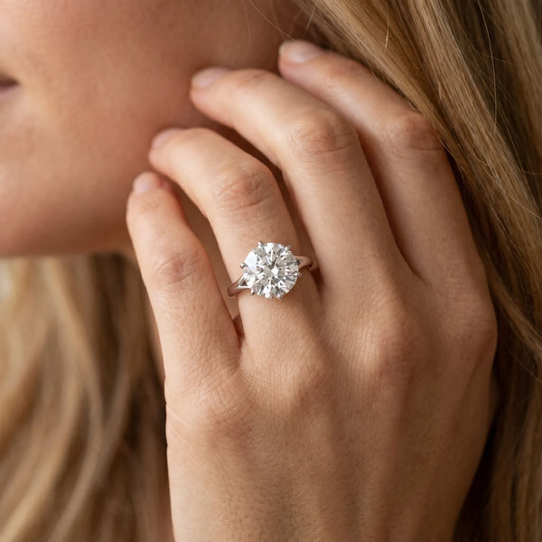 White gold Round Solitaire Diamond Ring with Six-Prong Setting and Tapered Band
