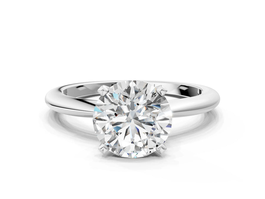 White gold Round Cut Diamond Solitaire Ring with Six-Prong Setting and Classic Band