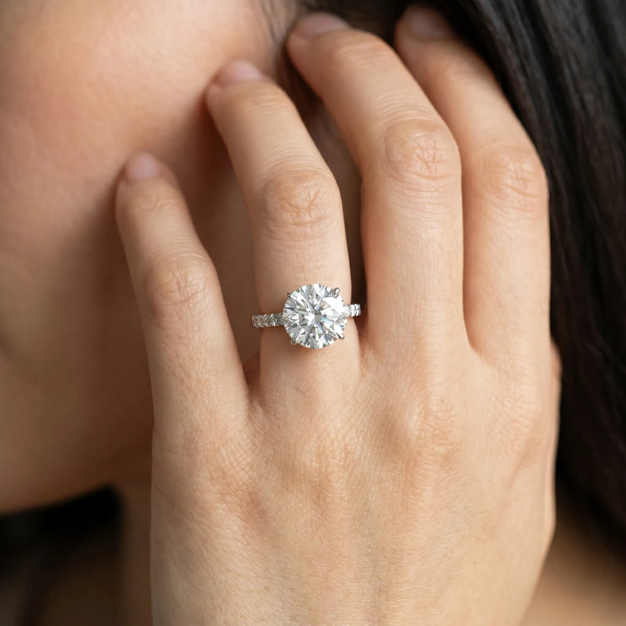 White gold Round Solitaire Diamond Ring with Tapered Band and Four-Prong Setting