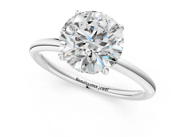 White gold Round Solitaire Diamond Ring with a Classic Band and Four-Prong Setting