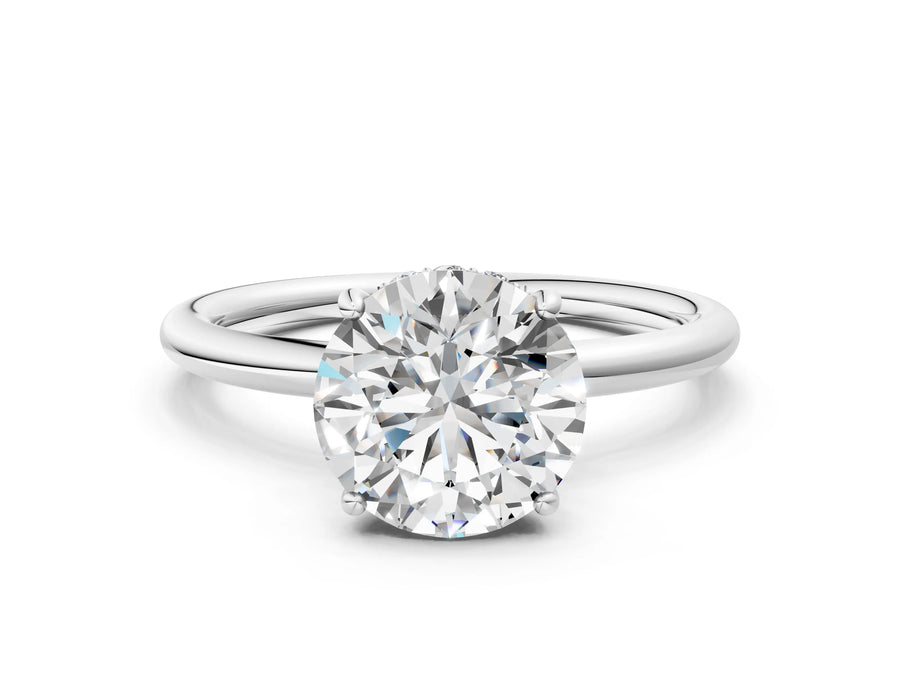 White gold Round Solitaire Diamond Ring with a Classic Band and Four-Prong Setting