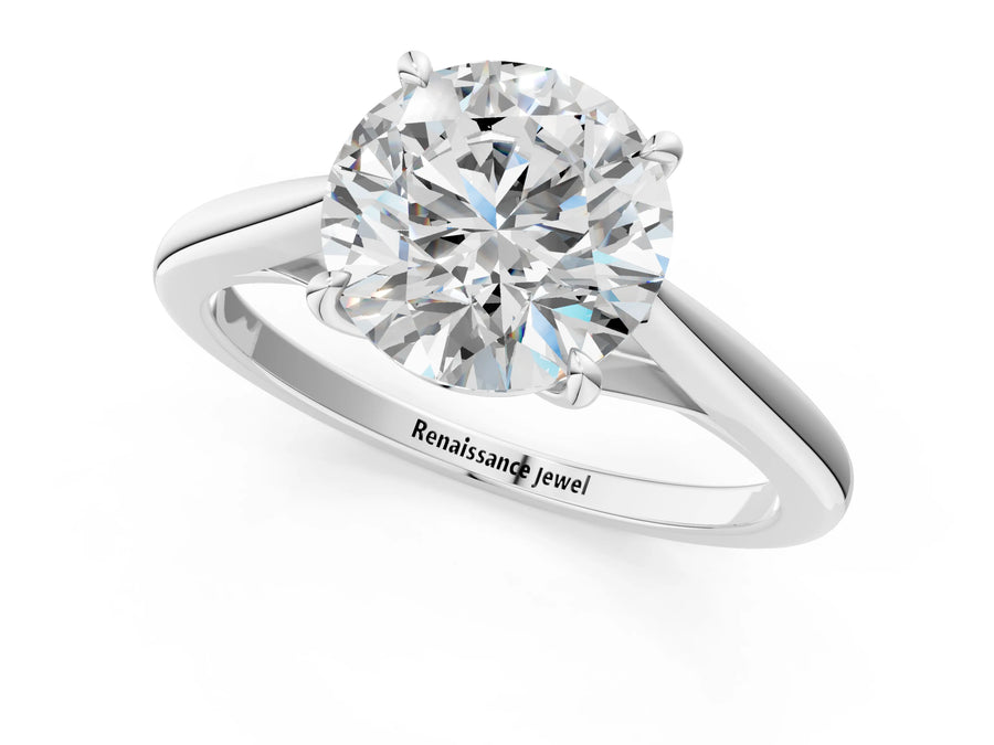 White gold Round Solitaire Engagement Ring with Four-Prong Setting and Classic Band