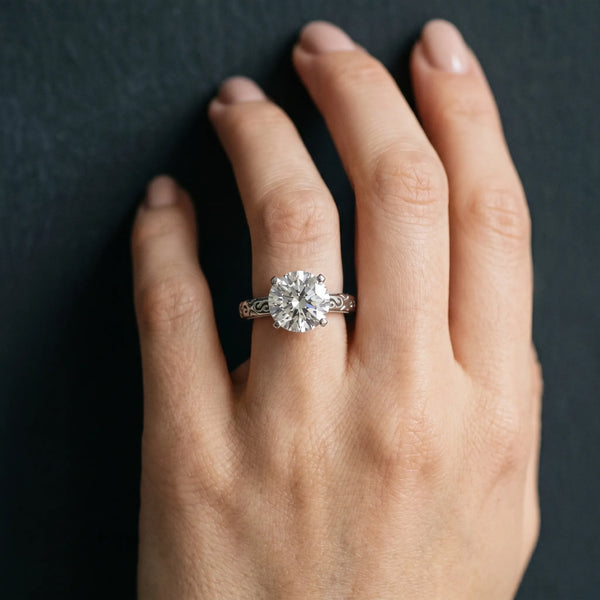 White gold Round Solitaire Engagement Ring with Scrollwork Band and Four-Prong Setting