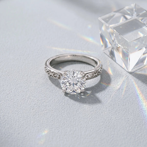White gold Round Solitaire Engagement Ring with Scrollwork Band and Four-Prong Setting