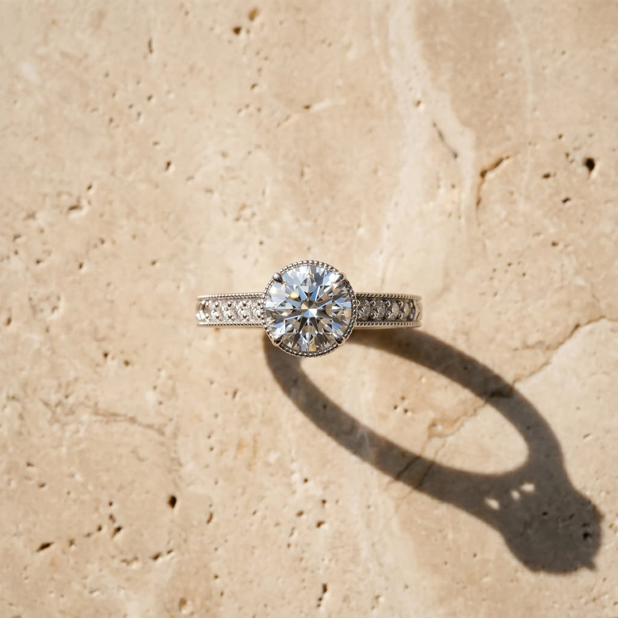 White gold Round Solitaire Pavé Diamond Milgrain Engagement Ring with Four-Prong Setting