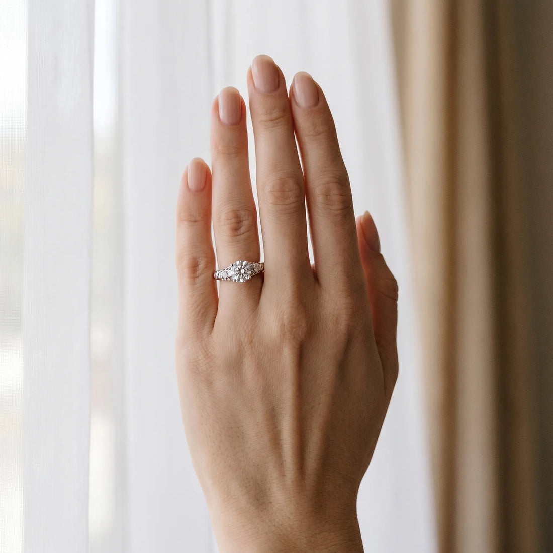 White gold Round Solitaire Scrollwork Engagement Ring with Side Stones and Four-Prong Setting_4