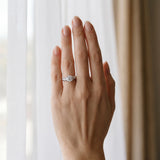 White gold Round Solitaire Scrollwork Engagement Ring with Side Stones and Four-Prong Setting_4