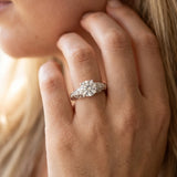 White gold Round Solitaire Scrollwork Engagement Ring with Side Stones and Four-Prong Setting_6