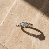 White gold Round Solitaire Scrollwork Engagement Ring with Side Stones and Four-Prong Setting_7