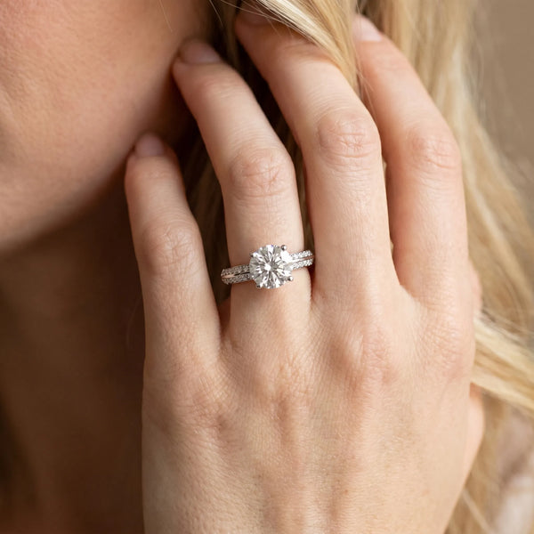 White gold Round Solitaire Split Shank Pave Diamond Engagement Ring with Four-Prong Setting
