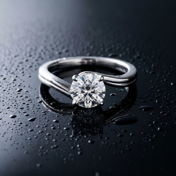 White gold Round Solitaire Twist Band Engagement Ring with Four-Prong Setting