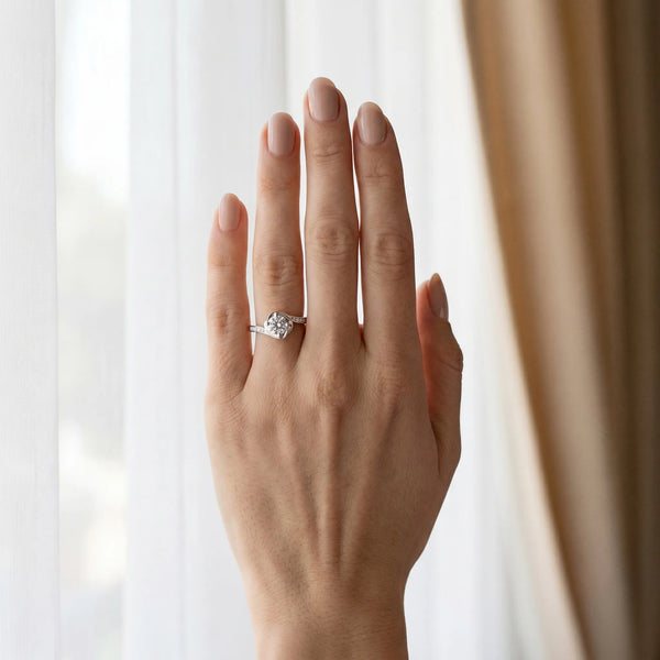 White gold Round Solitaire Twist Band with Channel-Set Diamonds and Four-Prong Setting