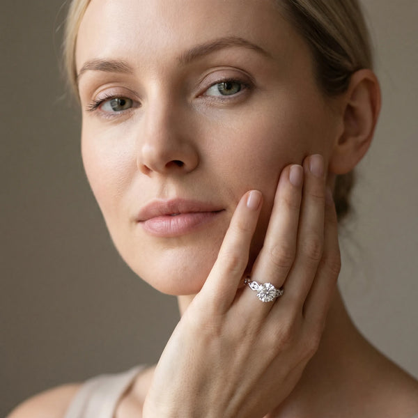 White gold Round Solitaire Twist Band with Leaf Prong Setting