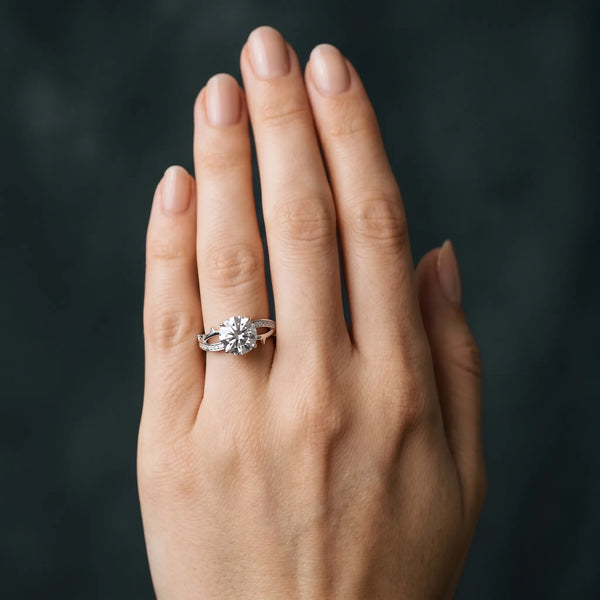White gold Round Solitaire Twist Band with Pavé Accents and Four-Prong Setting