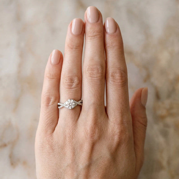 White gold Round Solitaire Twist Band with Pavé Setting and Four-Prong Mount