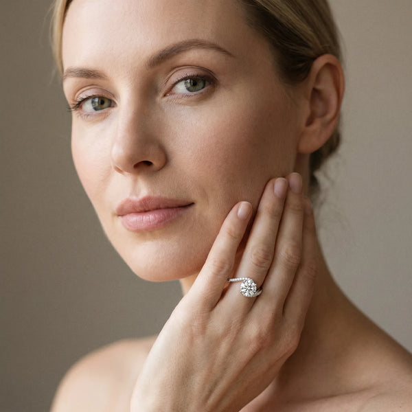 White gold Round Solitaire Twist Band with Pave Set Diamonds and Four-Prong Setting