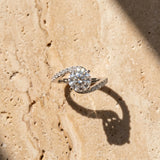 White gold Round Solitaire Twist Band with Pave Set Diamonds and Four-Prong Setting_15
