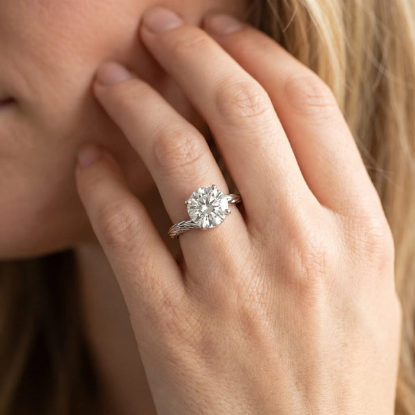 White gold Round Solitaire Twisted Band with Four-Prong Setting