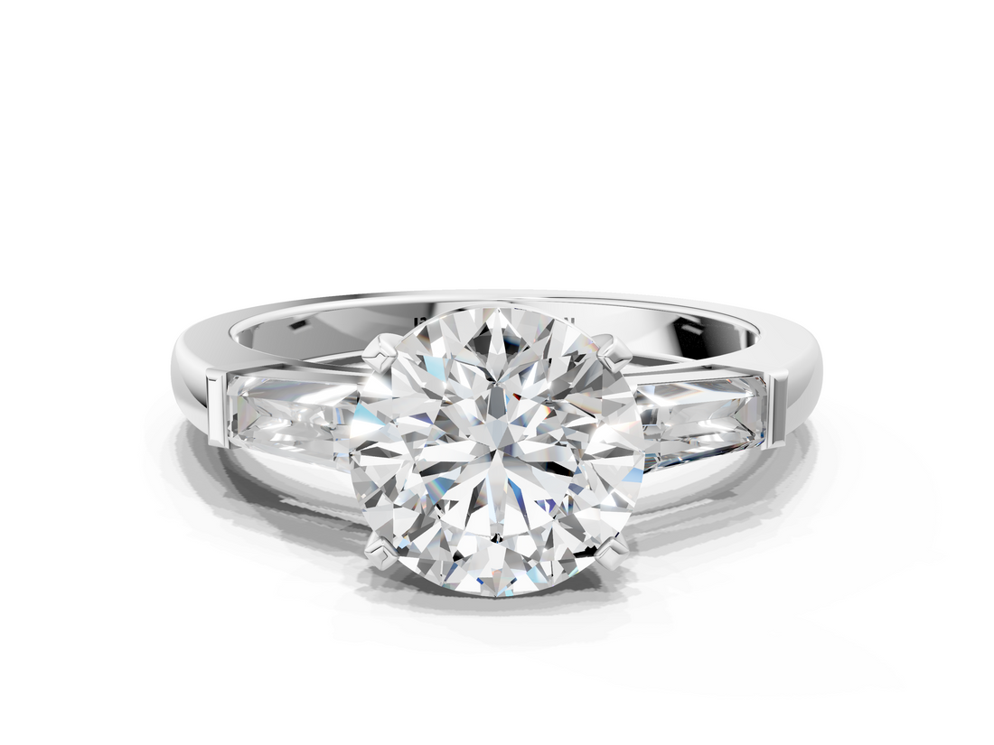 White gold Round Solitaire with Tapered Baguette Side Stones on a Classic Band with Four-Prong Setting_123