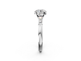 White gold Round Solitaire with Tapered Baguette Side Stones on a Classic Band with Four-Prong Setting_125