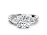 White gold Round Solitaire with Tapered Baguette Side Stones on a Classic Band with Four-Prong Setting_135