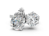 White gold Round and Pear Toi Moi Ring with Prong Setting and Pave Band