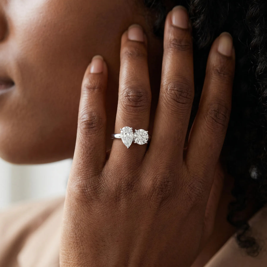 White gold Round and Pear Toi Moi Ring with Prong Setting and Plain Band