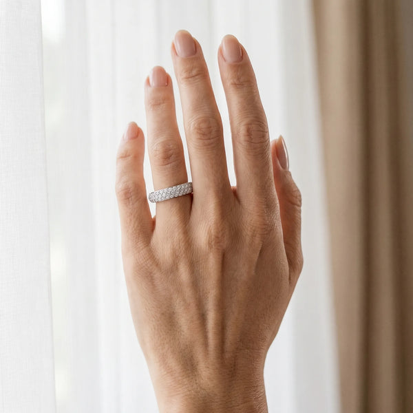 Platinum Three-Row Pave Round Diamond Eternity Band with Shared Prong Setting