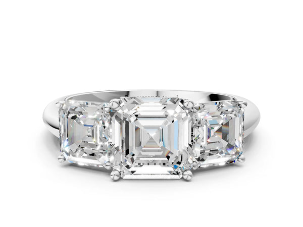 White gold Three-Stone Round Cut Diamond Engagement Ring with Prong Setting on a White Gold Band