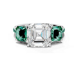 White gold Three-Stone Asscher Cut Diamond Ring with Round with Green Sapphire side stone Pavé Band and Prong Setting