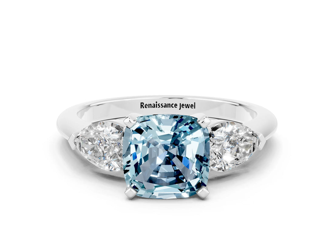 White gold Three-Stone Cushion Cut Aquamarine Ring with Pear Side Stones and Four-Prong Setting