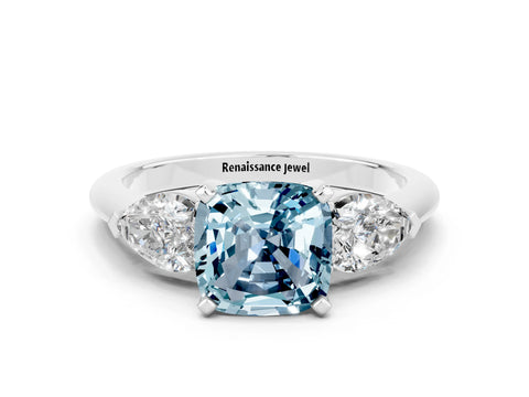 White gold Three-Stone Cushion Cut Aquamarine Ring with Pear Side Stones and Four-Prong Setting