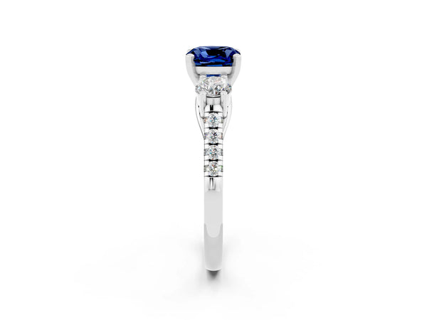Silver Three-Stone Cushion Cut Blue Sapphire Pavé Band with Four-Prong Setting