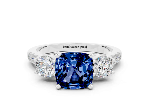 Silver Three-Stone Cushion Cut Blue Sapphire Pavé Band with Four-Prong Setting