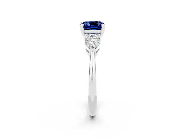 White gold Three-Stone Cushion Cut Blue Sapphire Ring with Pear Side Stones and Four-Prong Setting