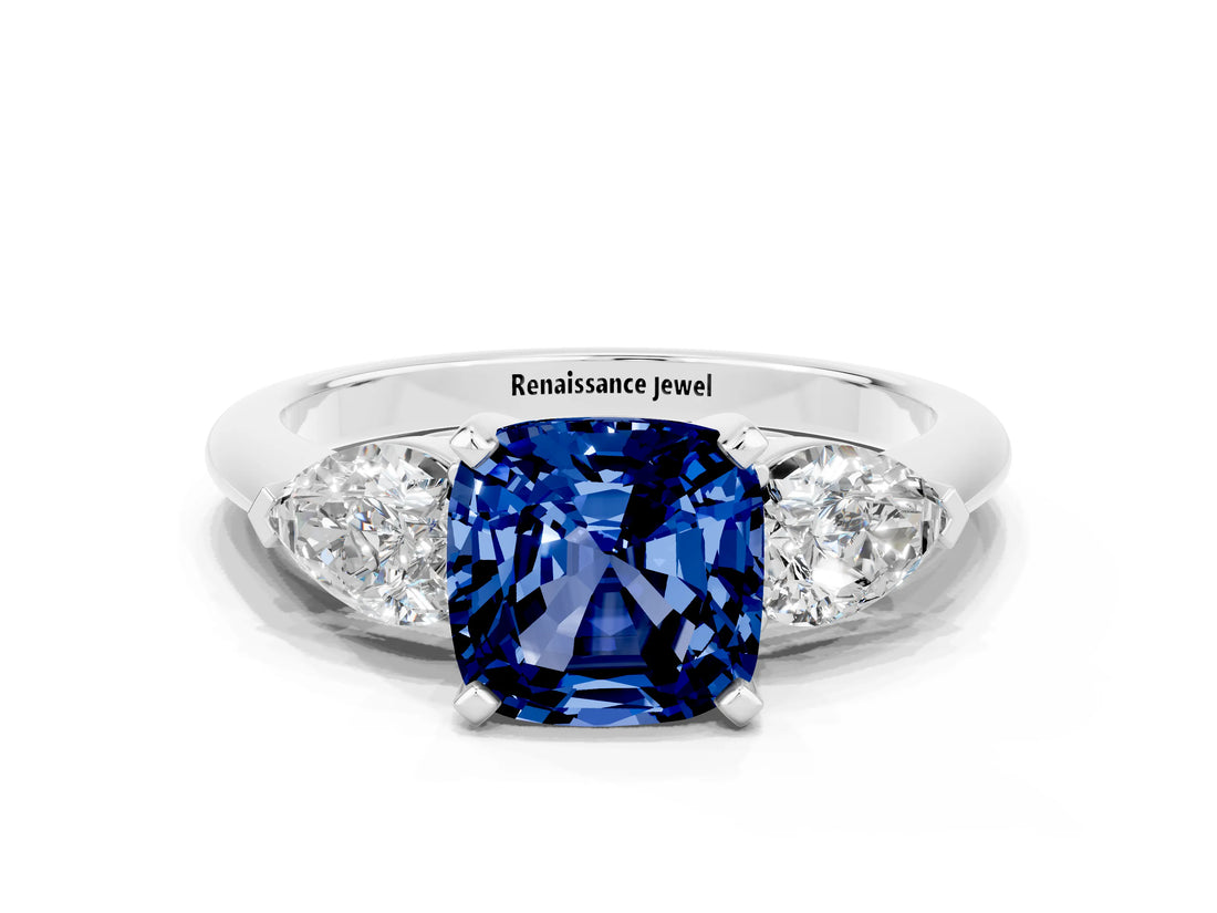 White gold Three-Stone Cushion Cut Blue Sapphire Ring with Pear Side Stones and Four-Prong Setting