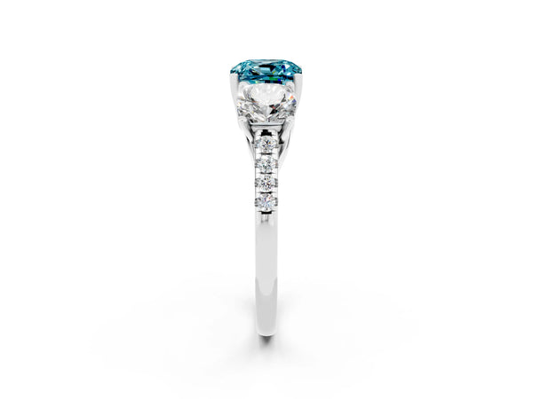 Platinum Three-Stone Cushion Cut Blue Topaz Ring with Round  Pavé Band and Prong Setting