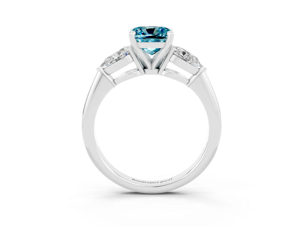 White gold Three-Stone Cushion Cut Blue Topaz Ring with Pear Side Stones and Four-Prong Setting