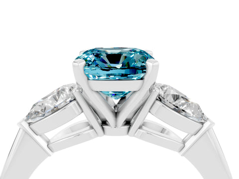 White gold Three-Stone Cushion Cut Blue Topaz Ring with Pear Side Stones and Four-Prong Setting_4