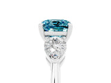 White gold Three-Stone Cushion Cut Blue Topaz Ring with Pear Side Stones and Four-Prong Setting_5