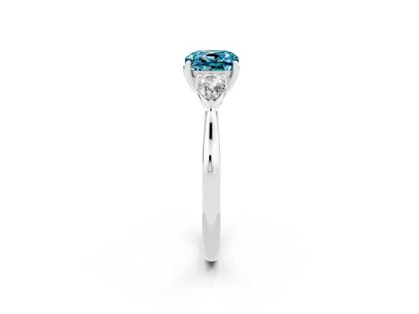 Silver Three-Stone Cushion Cut Blue Topaz Ring with Pear  Side Stones in Four-Prong Setting