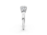 White gold Three-Stone Cushion Cut Cut Diamond Ring with Channel Set Band and Four-Prong Setting_52