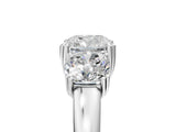 White gold Three-Stone Cushion Cut Cut Diamond Ring with Channel Set Band and Four-Prong Setting_55