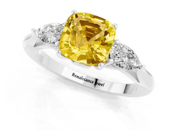 Platinum Three-Stone Cushion Cut Yellow Sapphire Ring with Pear  Side Stones in Four-Prong Setting