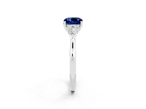 White gold Three-Stone Cushion Cut Cut Diamond Ring with Pear Side Stones in Four-Prong Setting_2