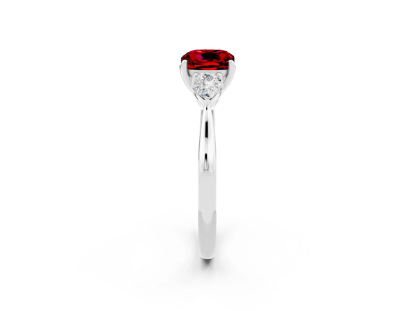 White gold Three-Stone Cushion Cut Cut Diamond Ring with Pear Side Stones in Four-Prong Setting